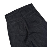 Back view of black denim jeans showcasing pockets and belt loops on plain background